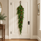 Guirnalda colgante Mix Pino con piñas de 122 cm en una puerta interior