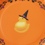 Zoom detalle plato melamina pollito amarillo sombrero bruja corona floral Halloween naranja 23cm